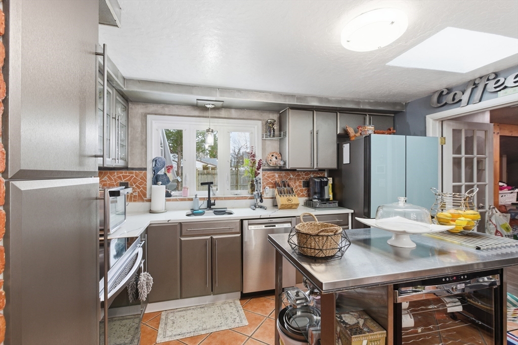 35 Errol Road Brockton, MA 02302 - Photo 4 of 20 a kitchen with a sink appliances and cabinets