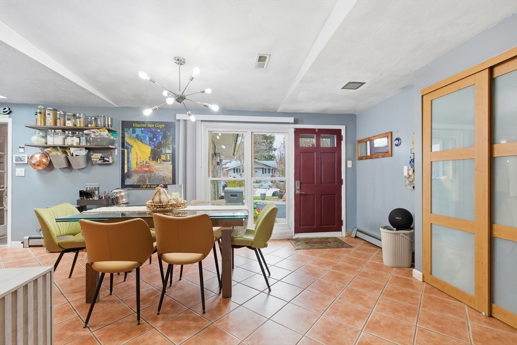 35 Errol Road Brockton, MA 02302 - Photo 5 of 20 a view of a dining room with furniture and chandelier
