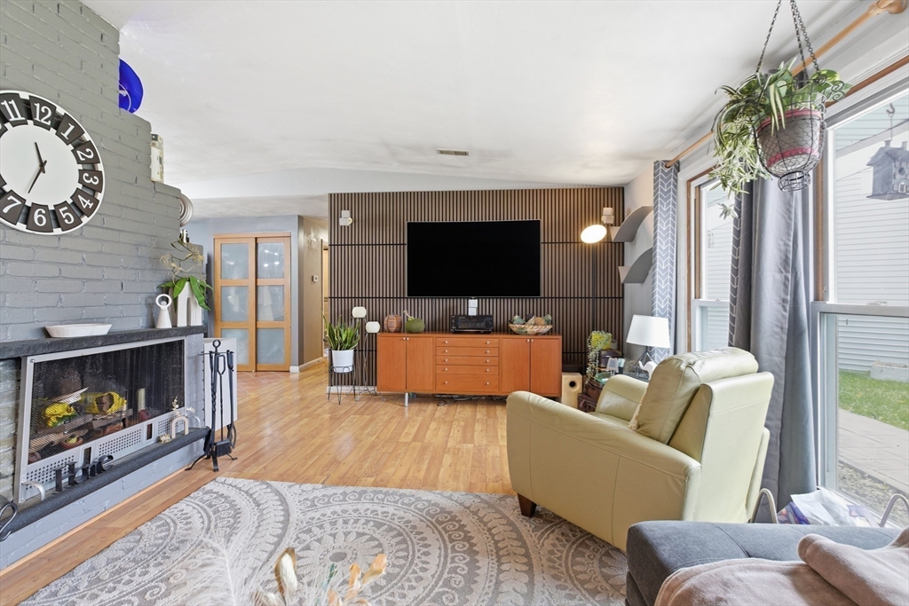 35 Errol Road Brockton, MA 02302 - Photo 7 of 20 a living room with furniture and a flat screen tv