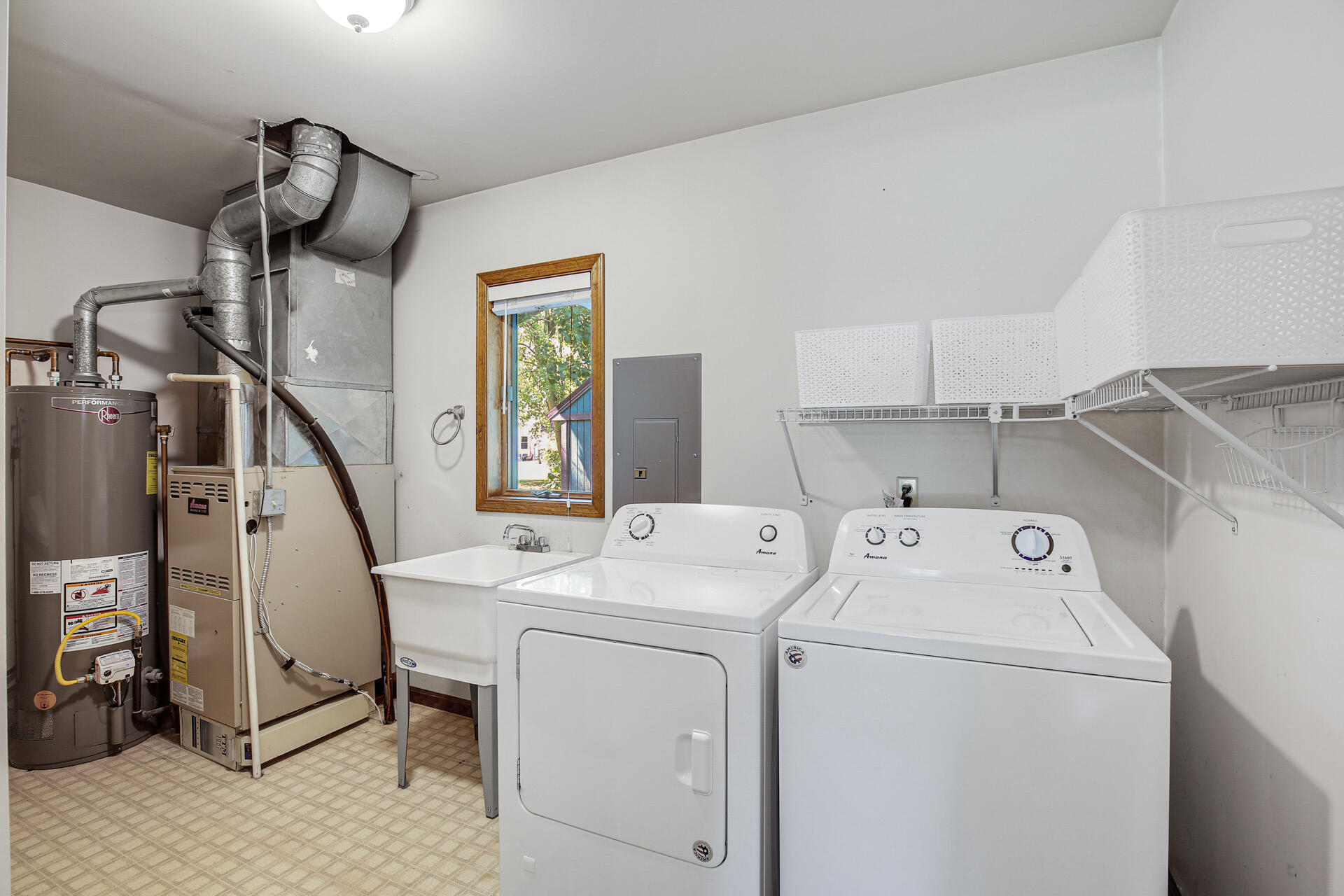2196 Elm Tree Lane Crown Point, IN 46307 - Photo 20 of 30 a view of storage and utility room with washer and dryer