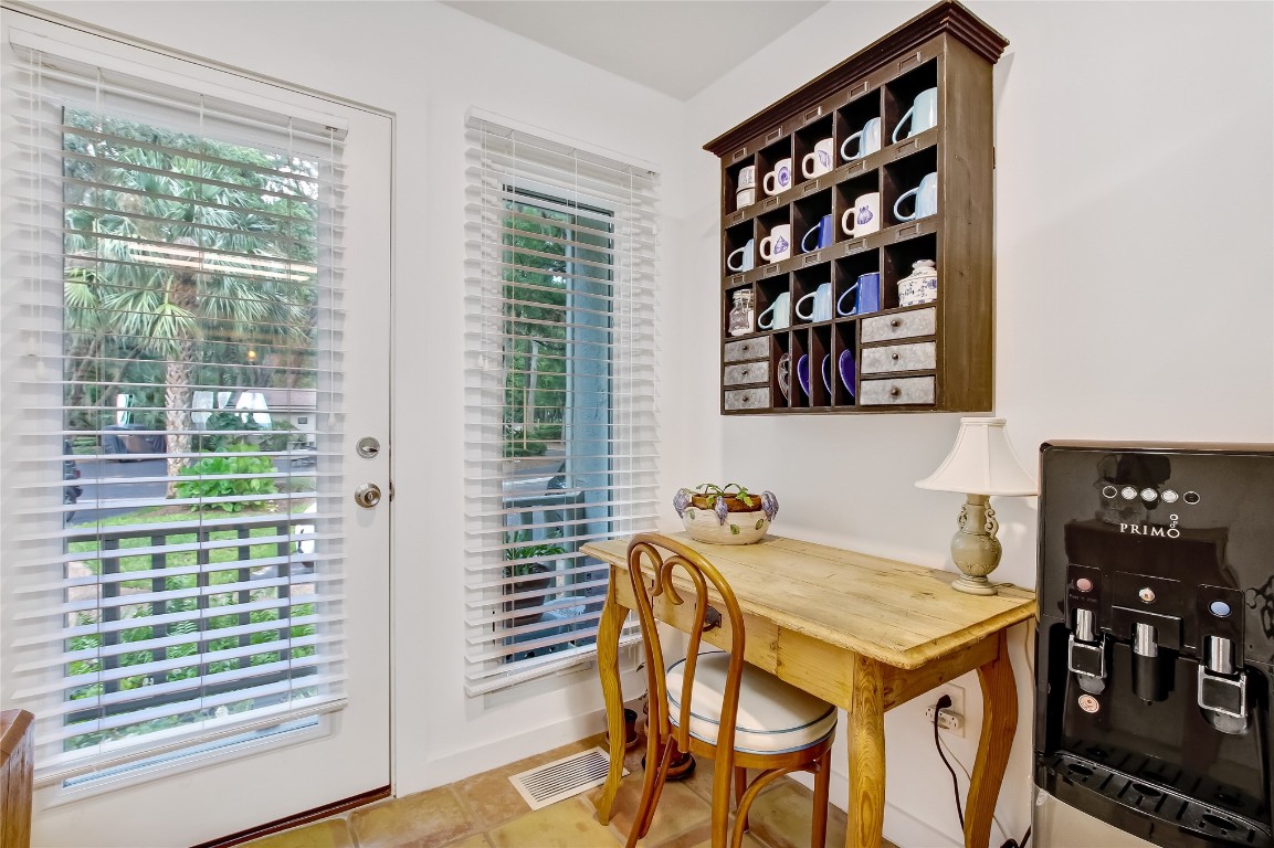 3426 Sea Marsh Road Fernandina Beach, FL 32034 - Photo 11 of 65 a view of a dining room with furniture and window