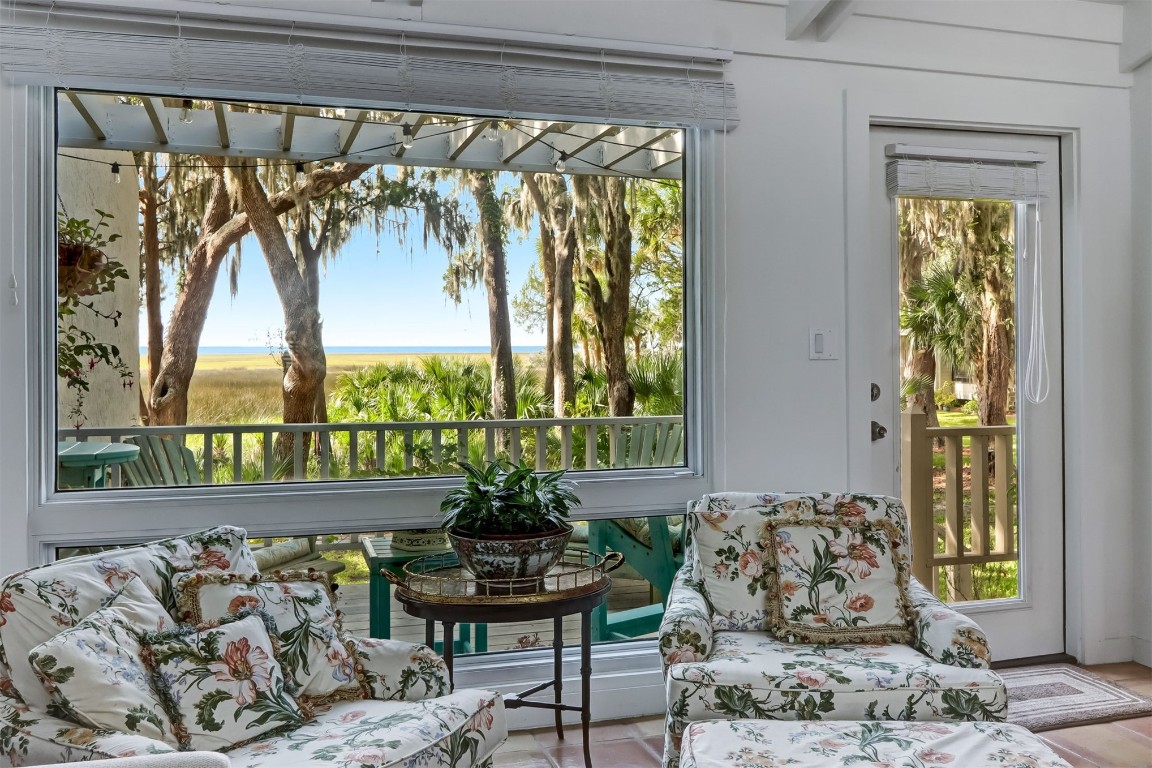 3426 Sea Marsh Road Fernandina Beach, FL 32034 - Photo 2 of 65 a outdoor living room with furniture and a potted plant