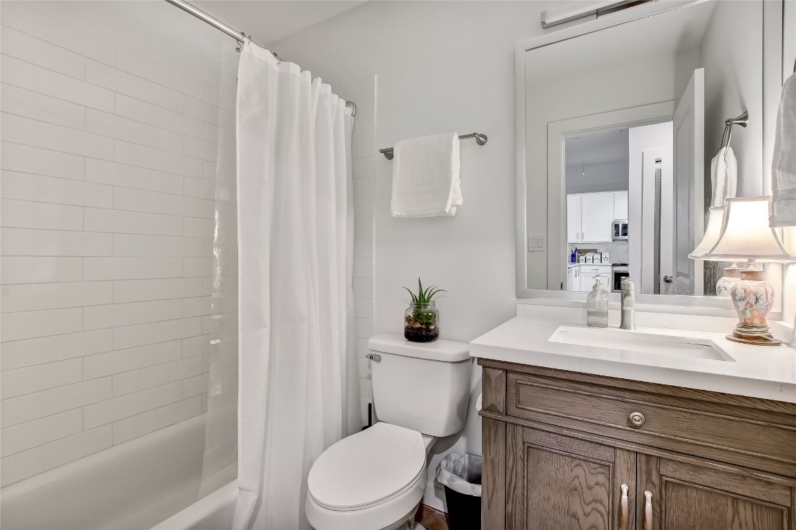 3426 Sea Marsh Road Fernandina Beach, FL 32034 - Photo 30 of 65 a bathroom with a sink a toilet and shower