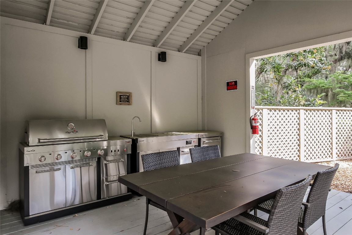 3426 Sea Marsh Road Fernandina Beach, FL 32034 - Photo 36 of 65 a view of a dining room with furniture window and outside view