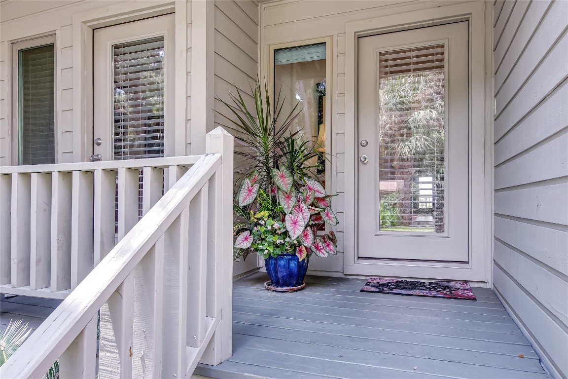 3426 Sea Marsh Road Fernandina Beach, FL 32034 - Photo 4 of 65 a view of an entryway with wooden floor and a window