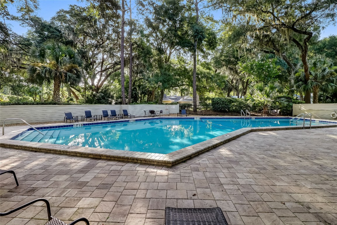 3426 Sea Marsh Road Fernandina Beach, FL 32034 - Photo 42 of 65 a view of swimming pool with a yard