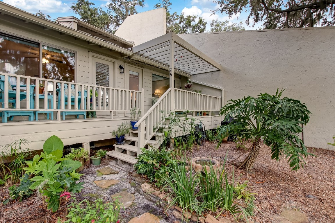 3426 Sea Marsh Road Fernandina Beach, FL 32034 - Photo 53 of 65 a view of a house with backyard and sitting area