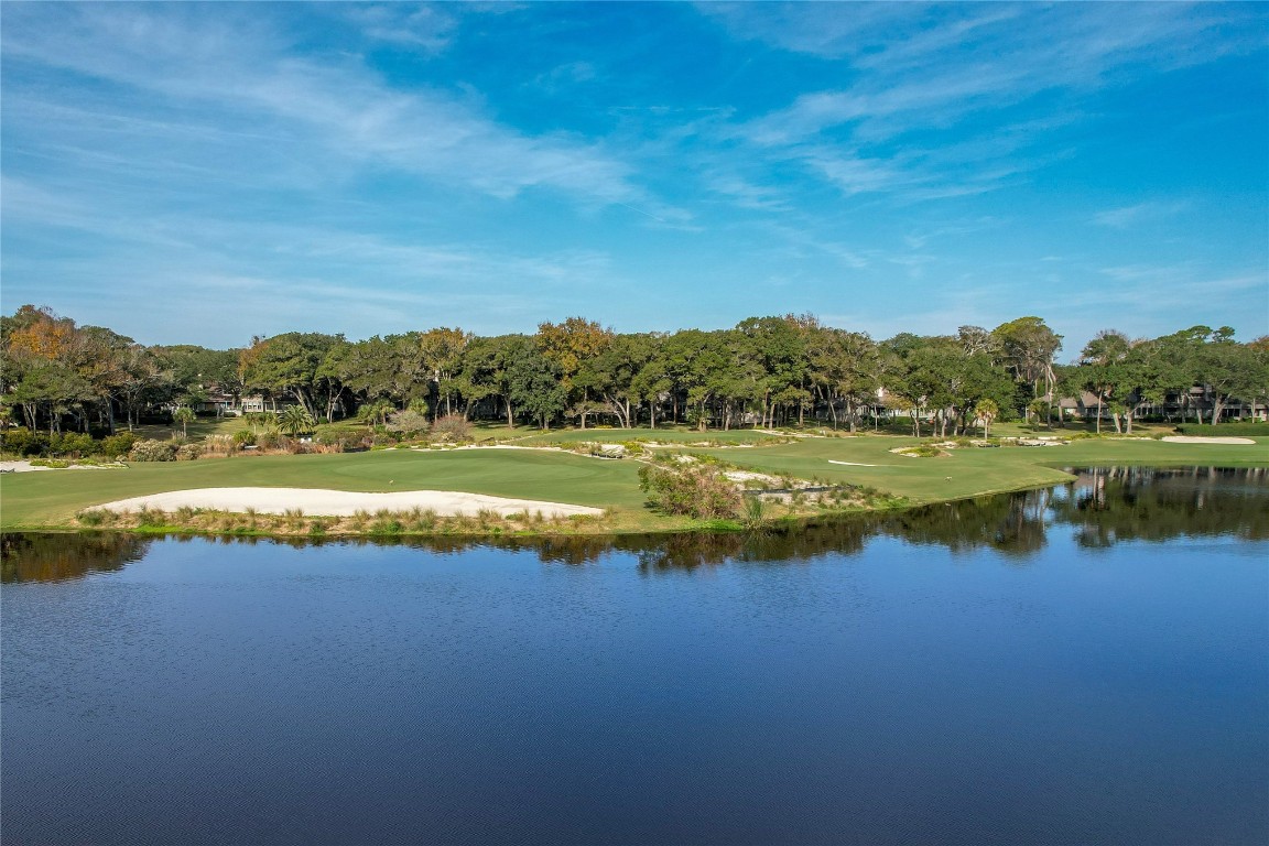 3426 Sea Marsh Road Fernandina Beach, FL 32034 - Photo 56 of 65 a view of a swimming pool and lake view