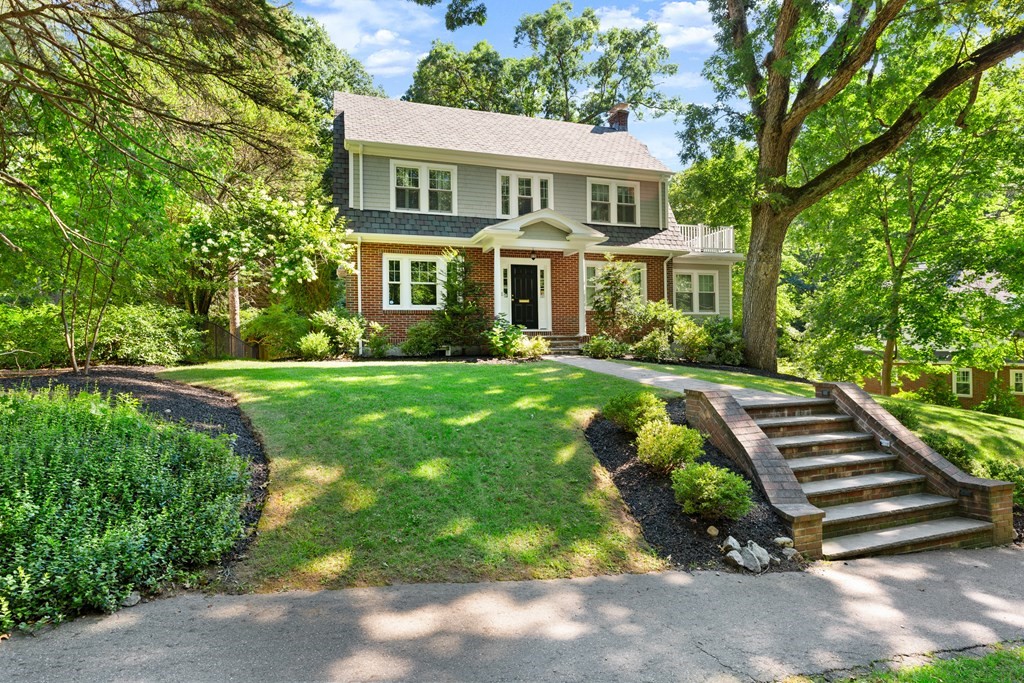 28 Hillside Road Wellesley, MA 02481 - Photo 1 of 25 a front view of a house with a yard