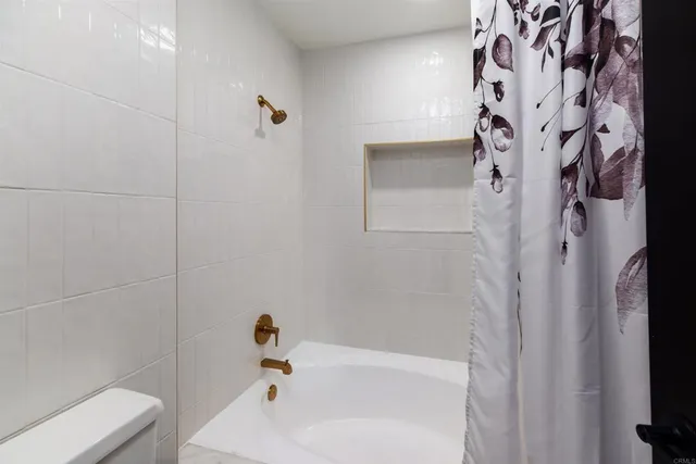 a bathroom with a sink and toilet