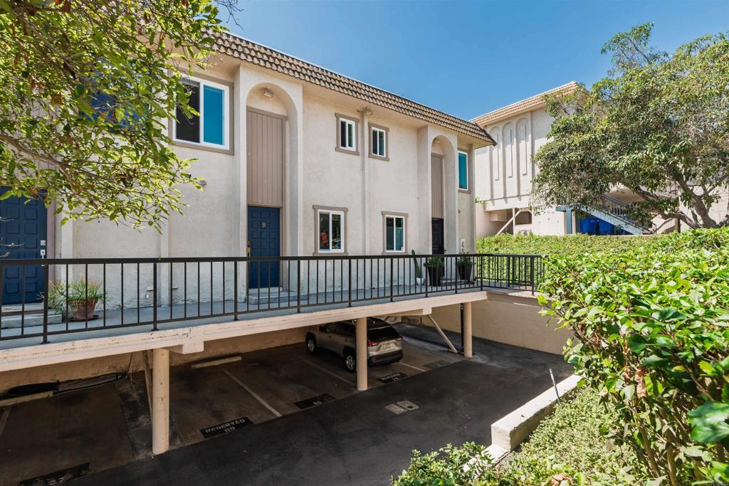 2349 Altisma Way, Unit B Carlsbad, CA 92009 - Photo 26 of 27 a balcony with table and chairs and potted plants