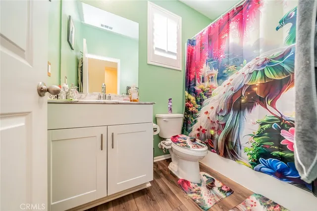 a kitchen with a sink stove top oven and refrigerator