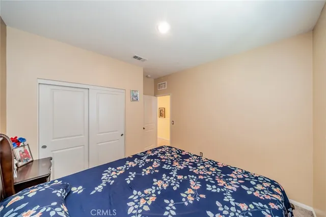 a view of a swimming pool with a table and chairs