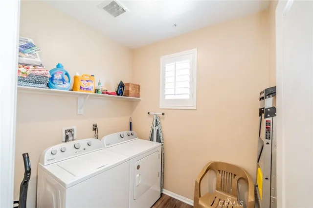 an aerial view of a house with a lake view