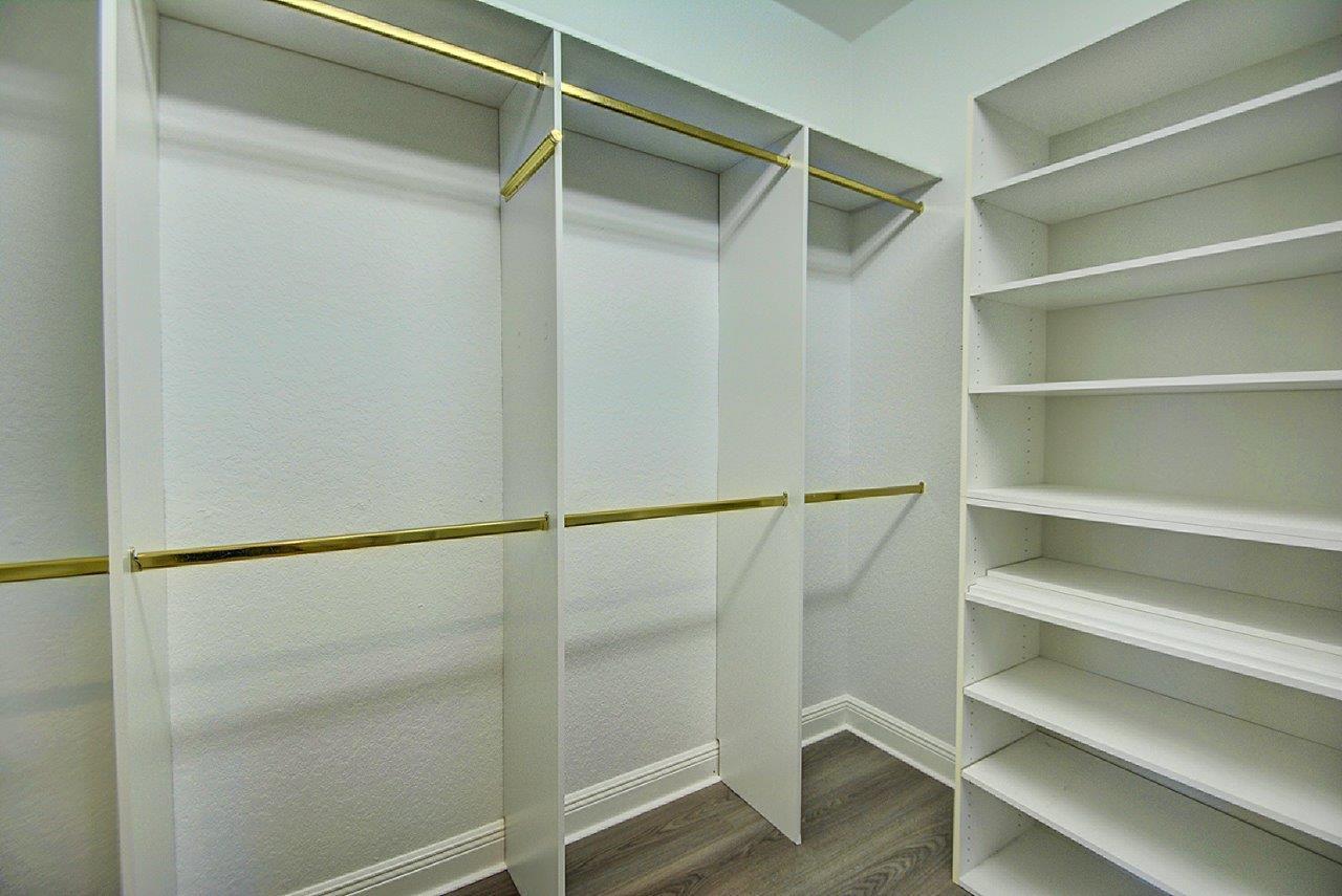 19473 Saturnia Lakes Drive Boca Raton, FL 33498 - Photo 11 of 22 a view of an empty walk in closet