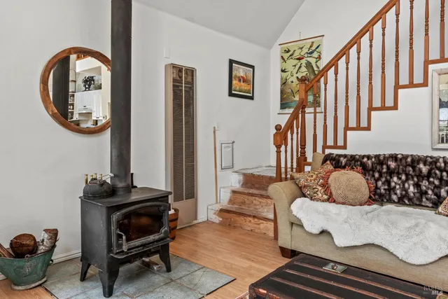 a view of a livingroom with furniture and window
