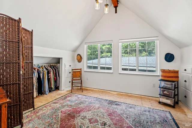 a bathroom with a sink a mirror and a toilet