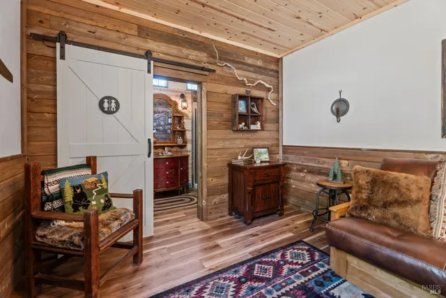 a utility room with multiple dryer and washer