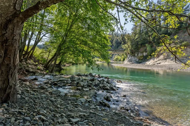 a view of lake with green space