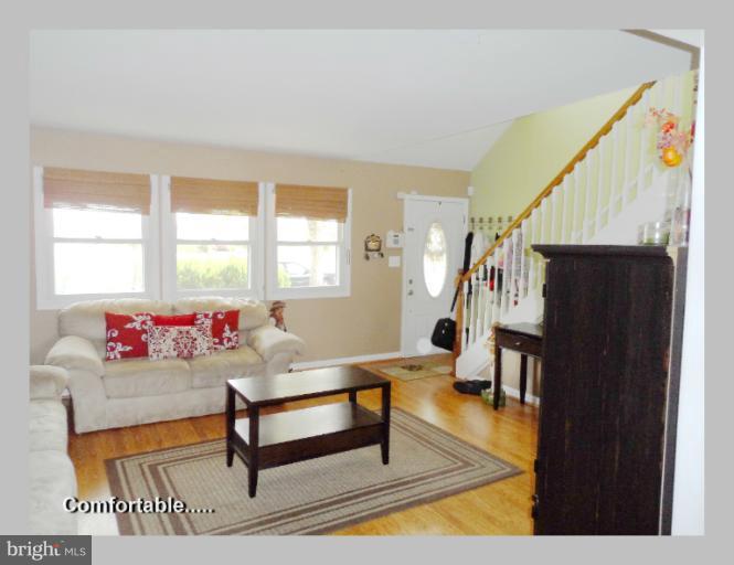 1934 Greengage Road Baltimore, MD 21244 - Photo 2 of 16 a living room with furniture and a window