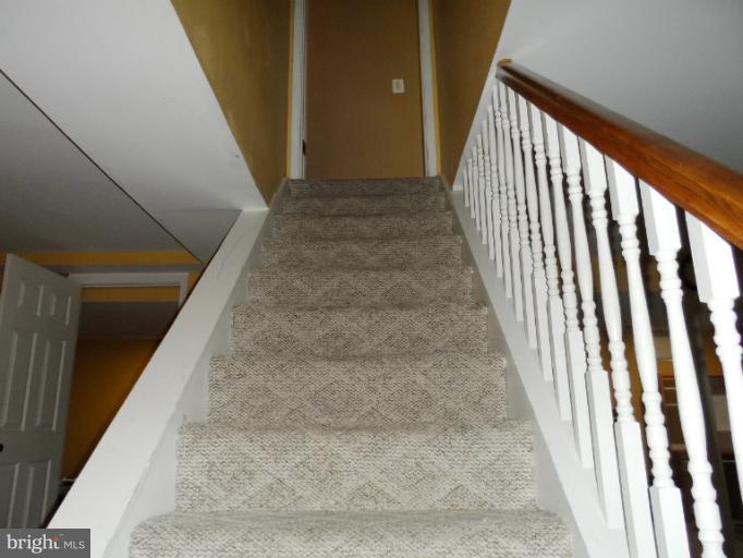 1934 Greengage Road Baltimore, MD 21244 - Photo 11 of 16 a view of a hallway to a window