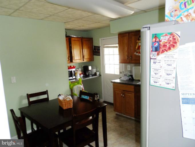 1934 Greengage Road Baltimore, MD 21244 - Photo 4 of 16 a view of a workspace with furniture