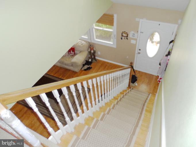 1934 Greengage Road Baltimore, MD 21244 - Photo 5 of 16 a bedroom with a bed and a window