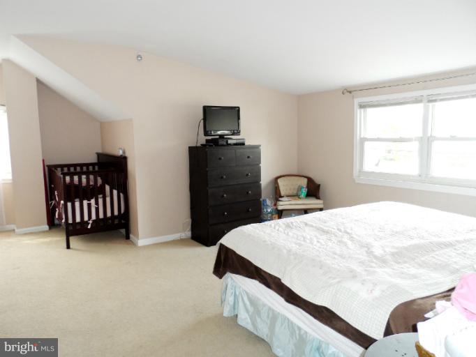 1934 Greengage Road Baltimore, MD 21244 - Photo 6 of 16 a bedroom with a bed and a closet