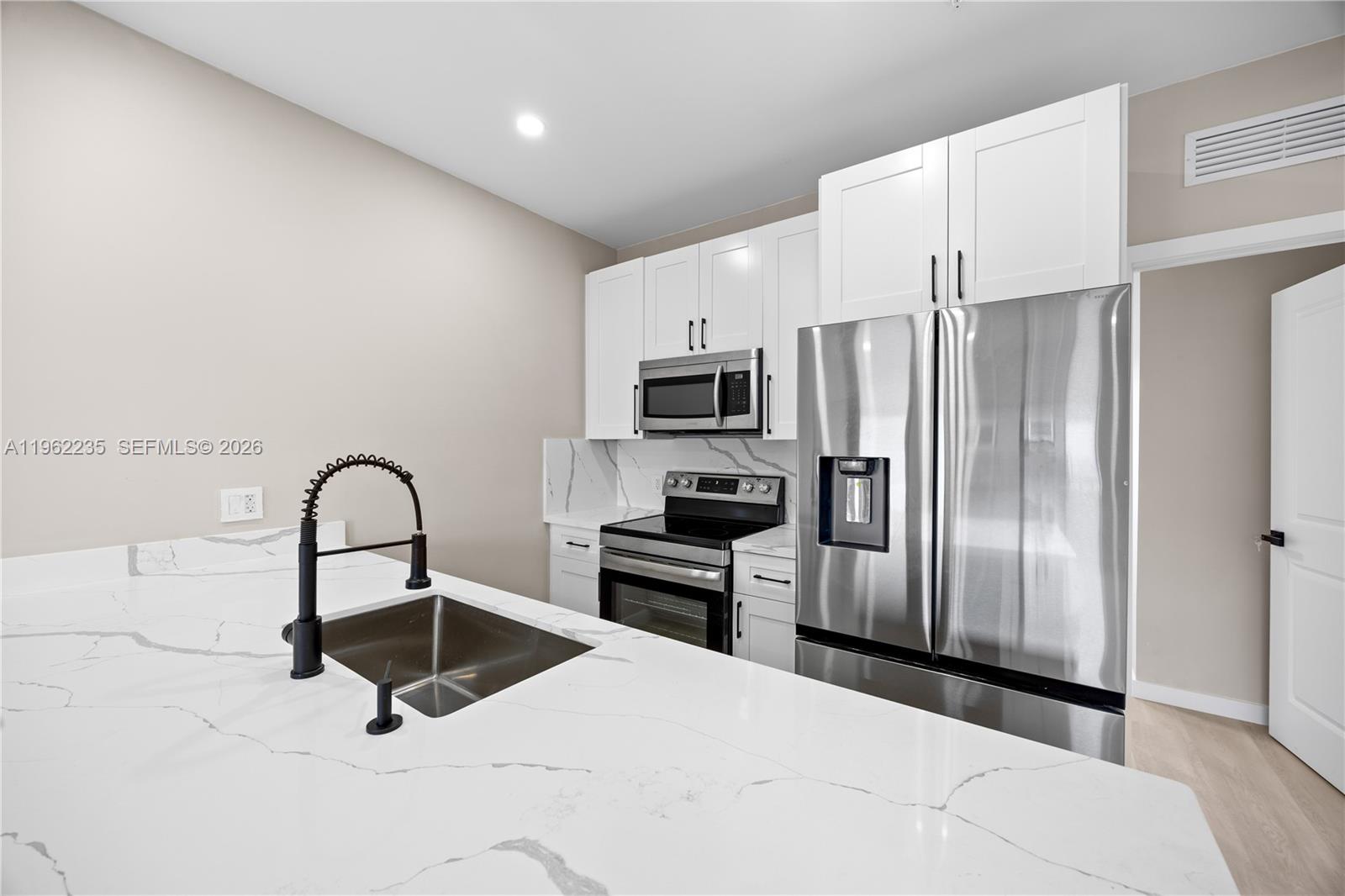 630 Northeast 166th Street, Unit 3 Miami, FL 33162 - Photo 8 of 35