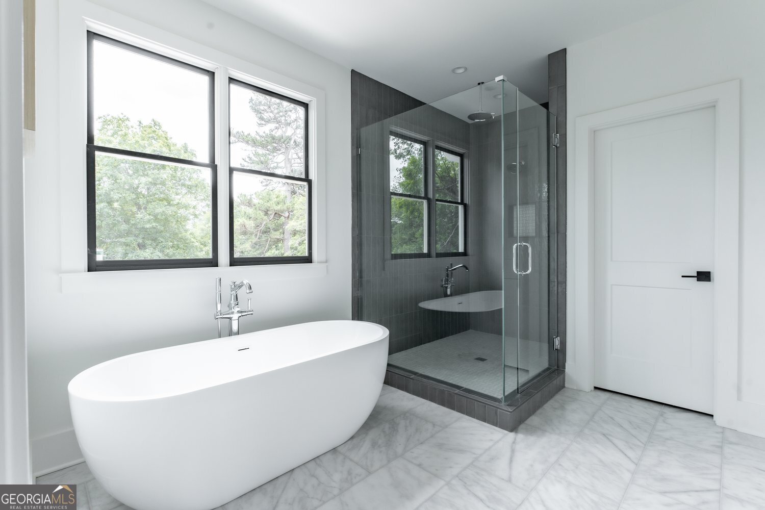 430 Allendale Drive Southeast Atlanta, GA 30317 - Photo 5 of 7 a bathroom with a tub a toilet and a shower