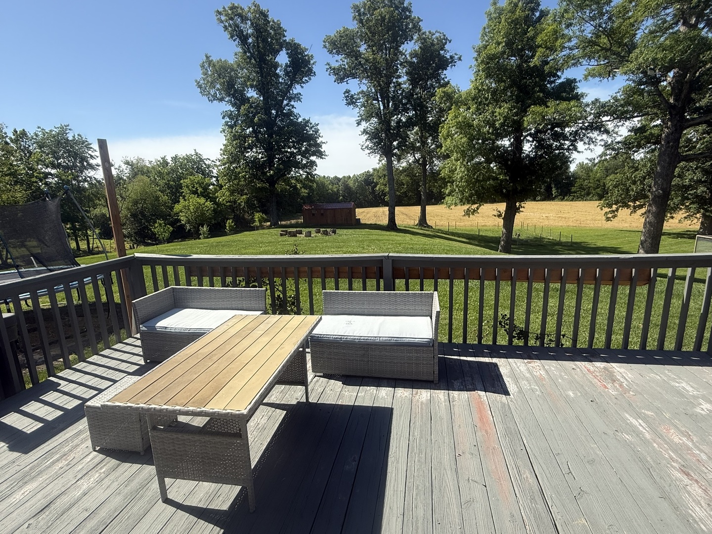 5012 Rosebud Road Metropolis, IL 62960 - Photo 29 of 44 a view of deck with wooden floor and outdoor seating