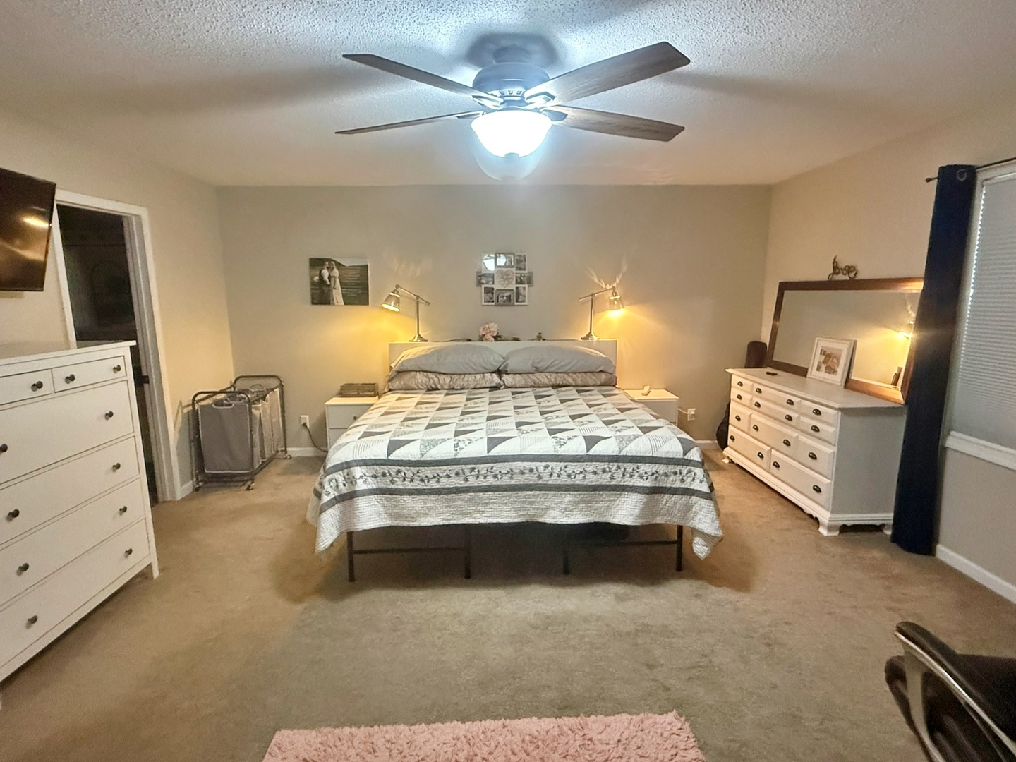 5012 Rosebud Road Metropolis, IL 62960 - Photo 30 of 44 a bedroom with a bed and a chandelier