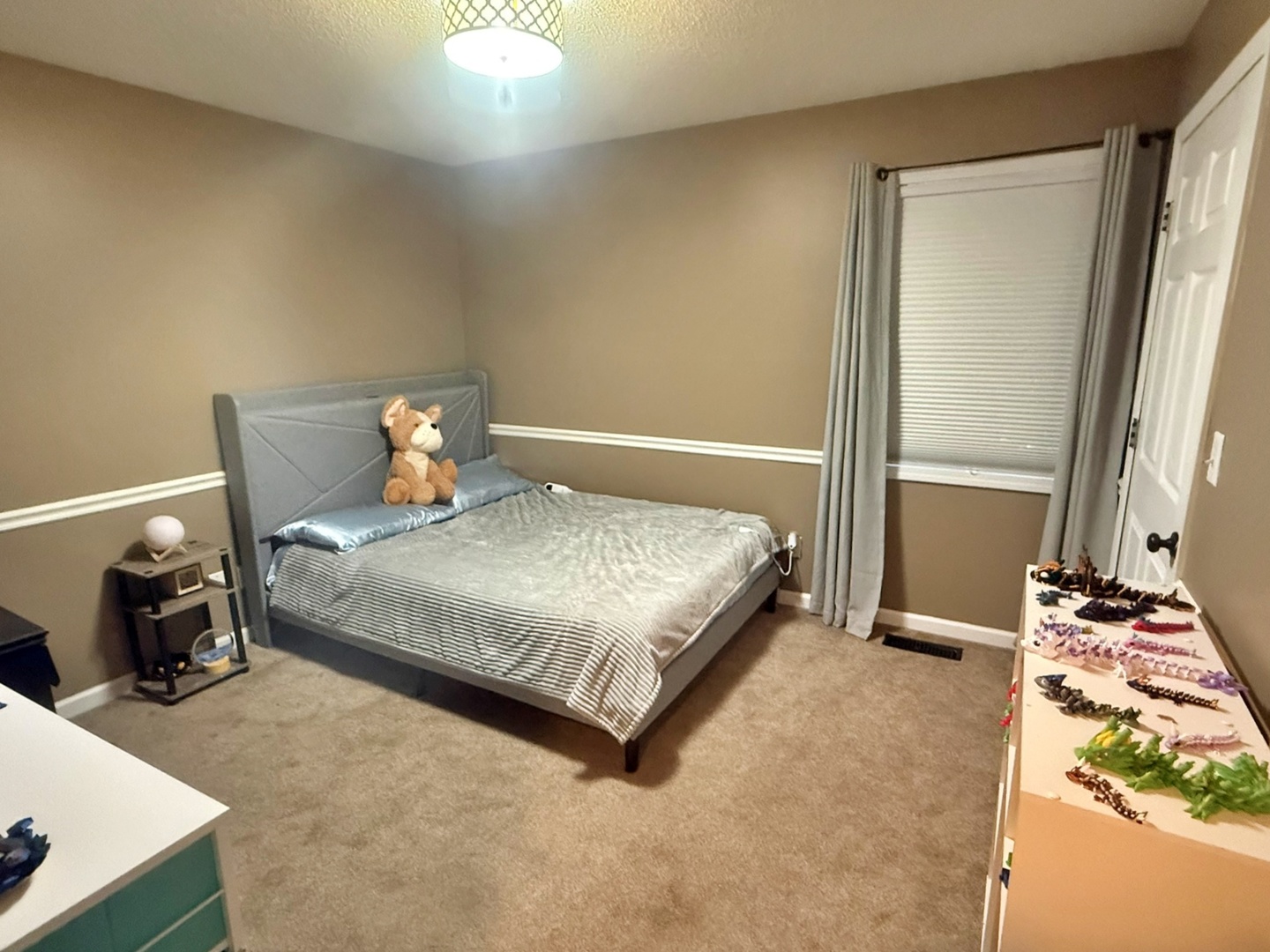 5012 Rosebud Road Metropolis, IL 62960 - Photo 38 of 44 a bedroom with a bed and wooden floor