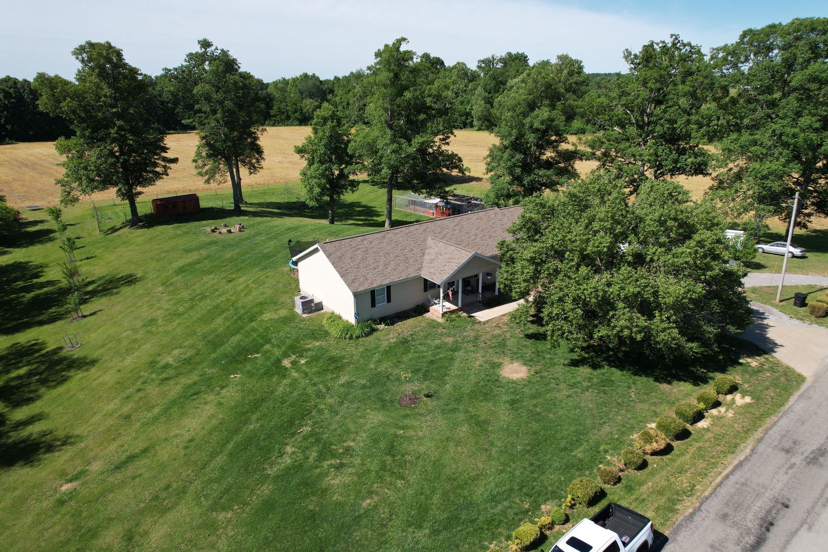 5012 Rosebud Road Metropolis, IL 62960 - Photo 7 of 44 a view of a house with a yard