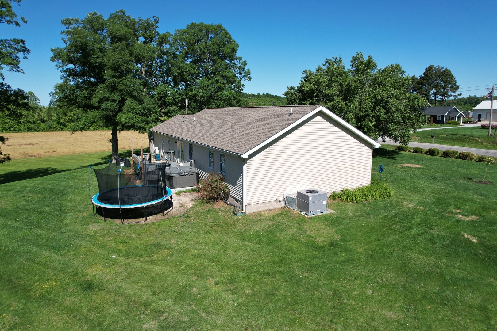 5012 Rosebud Road Metropolis, IL 62960 - Photo 10 of 44 a view of a house with backyard and garden