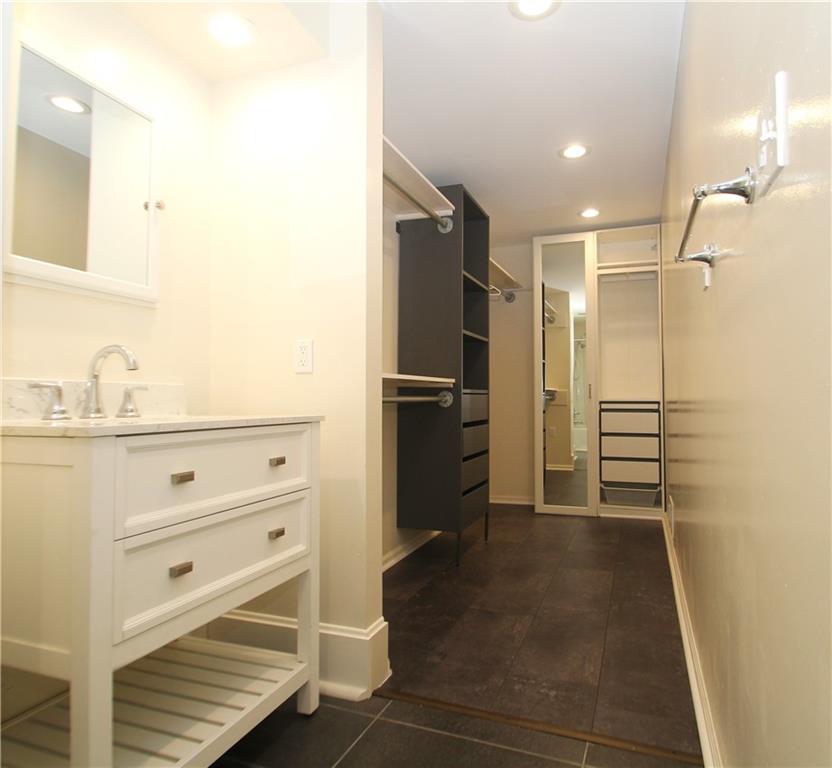 1406 Firth Street, Unit 1 Pittsburgh, PA 15212 - Photo 12 of 19 a bathroom with a shower and a sink