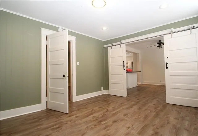 a view of entryway with wooden floor