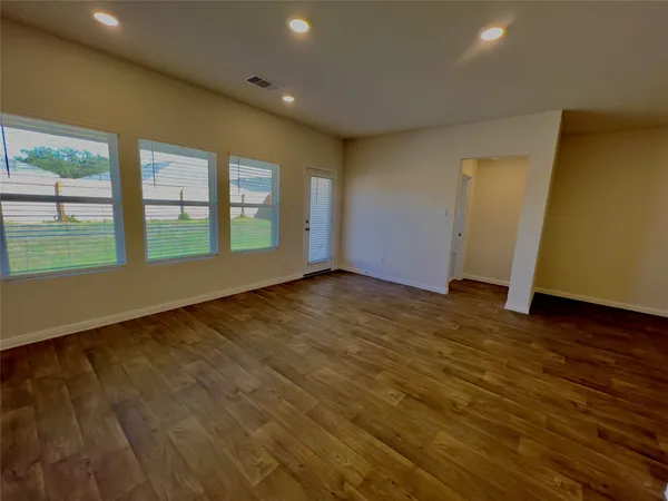 a kitchen with a stove and a microwave