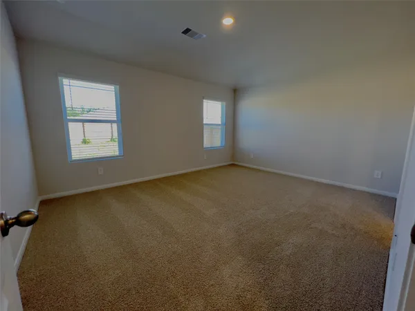 a kitchen that has a sink and a stove