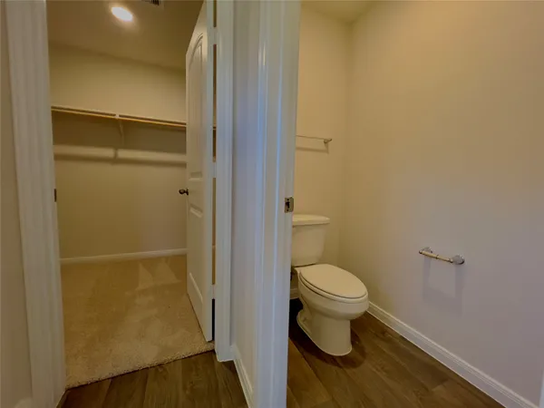 a bathroom with a double vanity sink and mirror