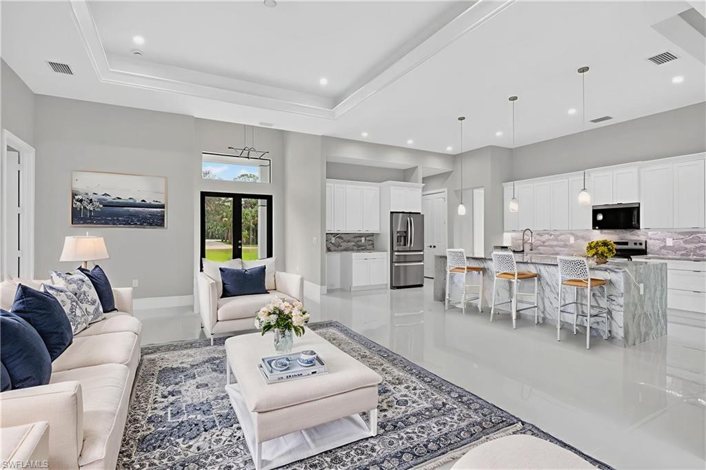 563 15th Street Northwest Naples, FL 34120 - Photo 3 of 33 Virtually Staged Living Room