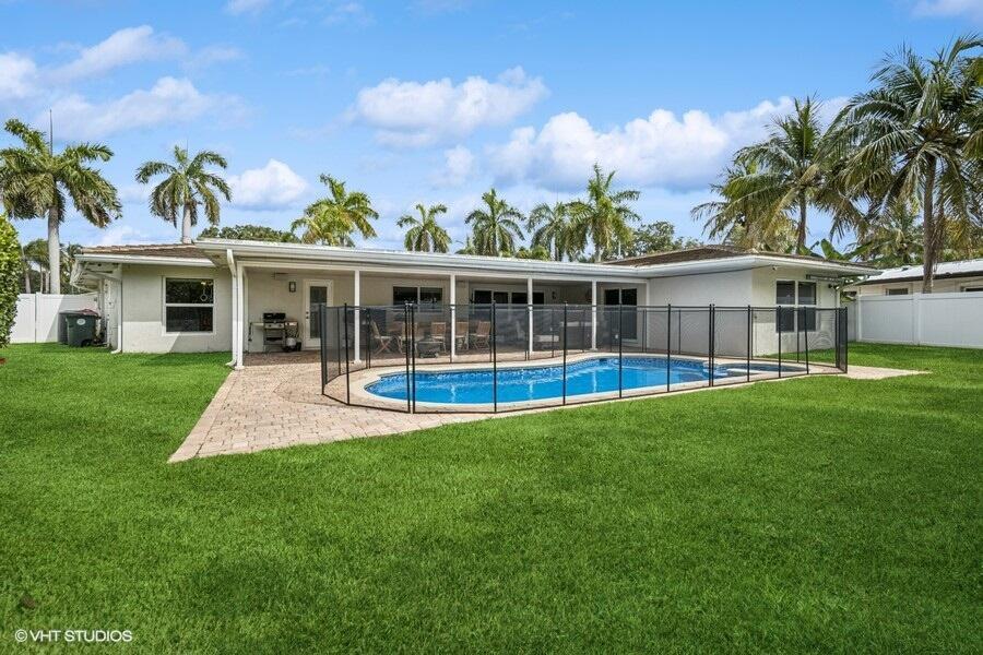 746 Southwest 2nd Street Boca Raton, FL 33486 - Photo 26 of 54 a view of house with yard and outdoor seating