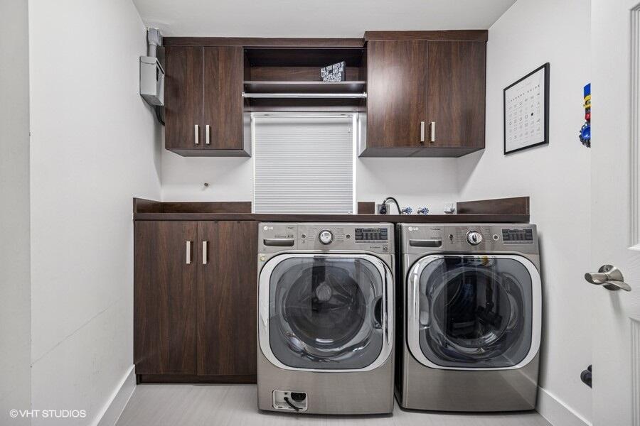 746 Southwest 2nd Street Boca Raton, FL 33486 - Photo 40 of 54 a utility room with sink dryer and washer