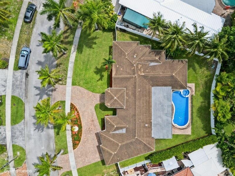 746 Southwest 2nd Street Boca Raton, FL 33486 - Photo 43 of 54 an aerial view of a house with garden space and swimming pool