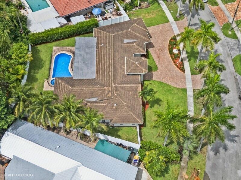 746 Southwest 2nd Street Boca Raton, FL 33486 - Photo 50 of 54 an aerial view of a house with a yard and garden