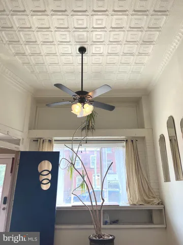 a bathroom with a sink a vanity and a mirror