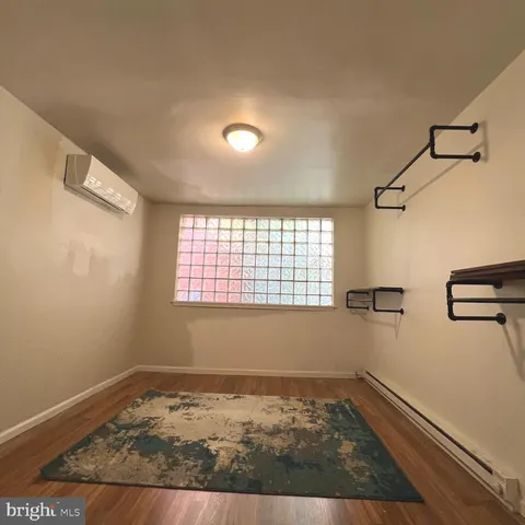 a view of gym room with gym equipment