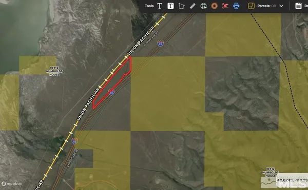 a view of a balcony and car parked