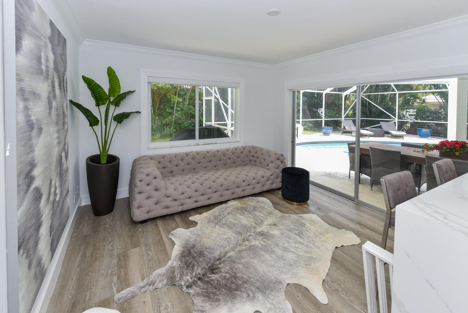 880 Hickory Terrace Boca Raton, FL 33486 - Photo 12 of 38 a living room with furniture lamp and potted plant