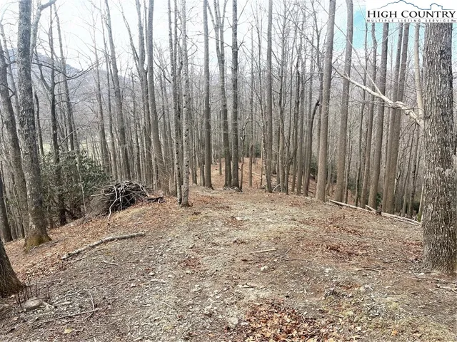 a view of outdoor space with wooden fence